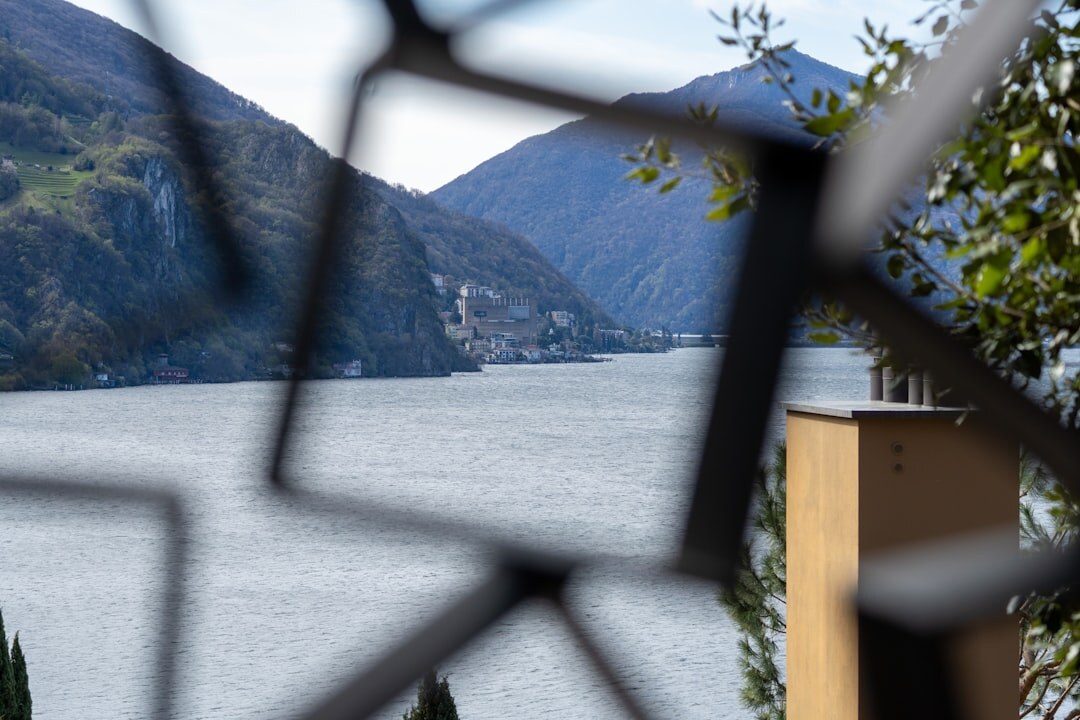 Luxury villa terrace overlooking a lake and mountains in Switzerland